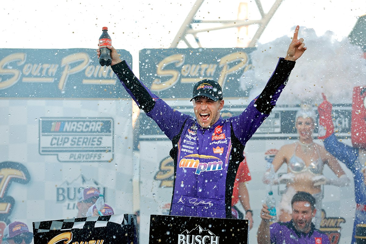 AP photo by Steve Marcus / Joe Gibbs Racing driver Denny Hamlin celebrates in victory lane at Las Vegas Motor Speedway after winning Sunday's NASCAR Cup Series playoff race and clinching a title-eligible spot in the Nov. 2 season finale at Phoenix Raceway.