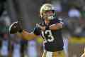 Notre Dame quarterback CJ Carr looks to throw during the third quarter of an NCAA college football game against North Carolina State, Saturday, Oct. 11, 2025, in South Bend, Ind. (AP Photo/Paul Beaty)