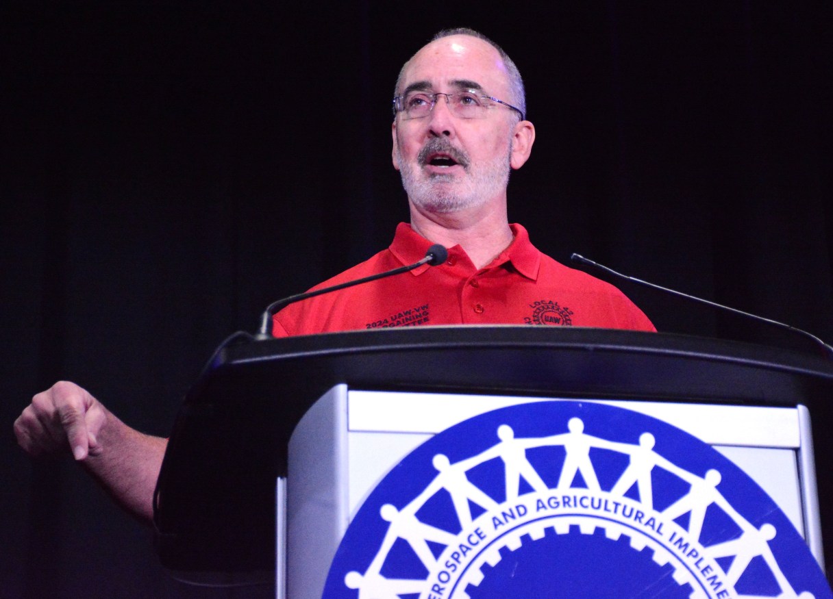 Staff Photo by Robin Rudd / UAW president Shawn Fain speaks during a rally in Chattanooga on Sept. 15, 2024. Fain has criticized Volkswagen during contract negations for the automaker's offers on job security.