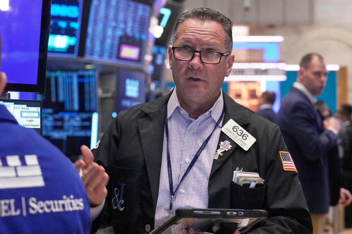 Trader Edward Curran works on the floor of the New York Stock Exchange, Monday, Nov. 24, 2025. (AP Photo/Richard Drew)