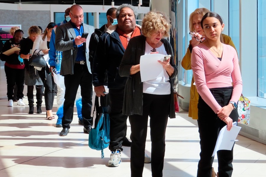 FILE - Applicants line up at a job fair at the Ocean Casino Resort in Atlantic City N.J., on April 11, 2022. (AP Photo/Wayne Parry, File)