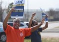 Staff file photo by Matt Hamilton / Walt Westfield, a senior organizer with Jobs With Justice in East Tennessee, waves to cars during a protest outside the Chattanooga Volkswagen plant. United Auto Workers members at the plant will vote on a contract with the company Feb. 18-19, 2026.