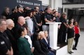 Staff Photo by Seth Carpenter/ UAW President Shawn Fain speaks alongside employees of Volkswagen's Chattanooga plant following a vote by the employees to approve their first union contract on Thursday, Feb. 19, 2026.