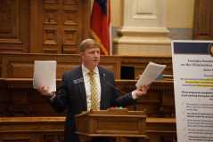 Sen. Blake Tillery, a Vidalia Republican, pulls apart a tax expenditure report for fiscal year 2027 while presenting a proposal to reduce the state’s income tax on Feb. 12, 2026 in Atlanta. Alander Rocha/Georgia Recorder