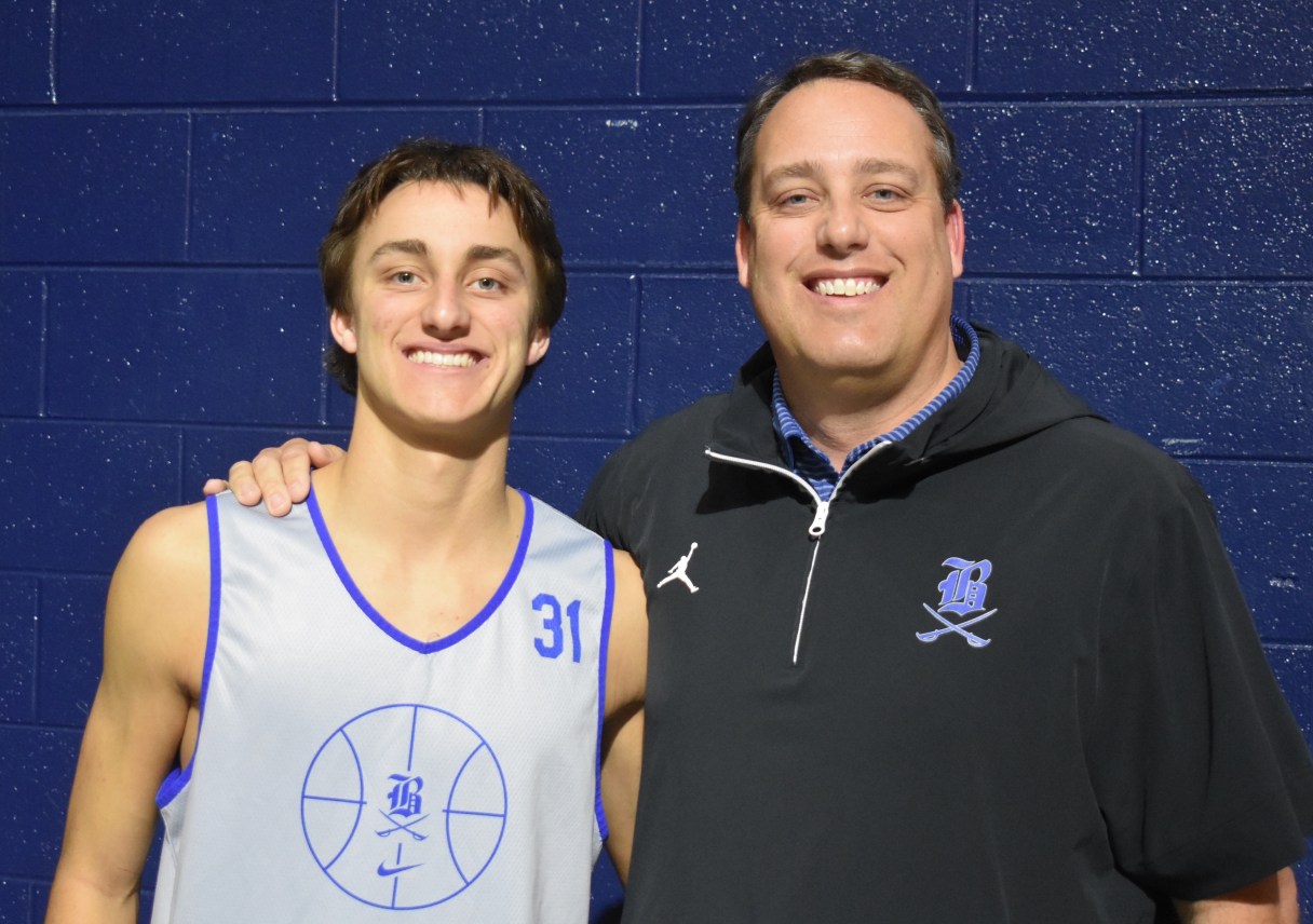 Staff photo by Patrick MacCoon / Boyd Buchanan senior Hudson Jones, left, has been a big part of the Buccaneers' first run to the TSSAA state semifinals since his dad, Chris, right, helped lead the program to its lone championship in 1996 as a junior guard.