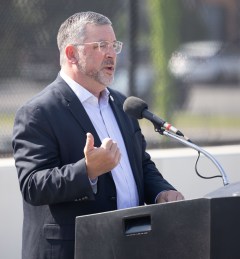 Staff photo by Larry Sullivan II / Tennessee Department of Transportation Commissioner Will Reid speaks at a ribbon-cutting on the Belvoir Avenue bridge. The ceremony marked the completion of the Interstate 75/Interstate 24 interchange reconstruction project.