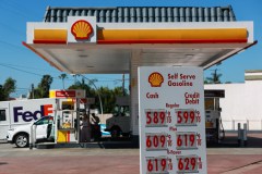 Photo by Patrick T. Fallon via AFP/Getty Images/TNS / Premium gasoline prices above $6 per gallon and diesel fuel prices above $7 a gallon are displayed outside of a Shell gas station in West Hollywood on April 14, 2026.