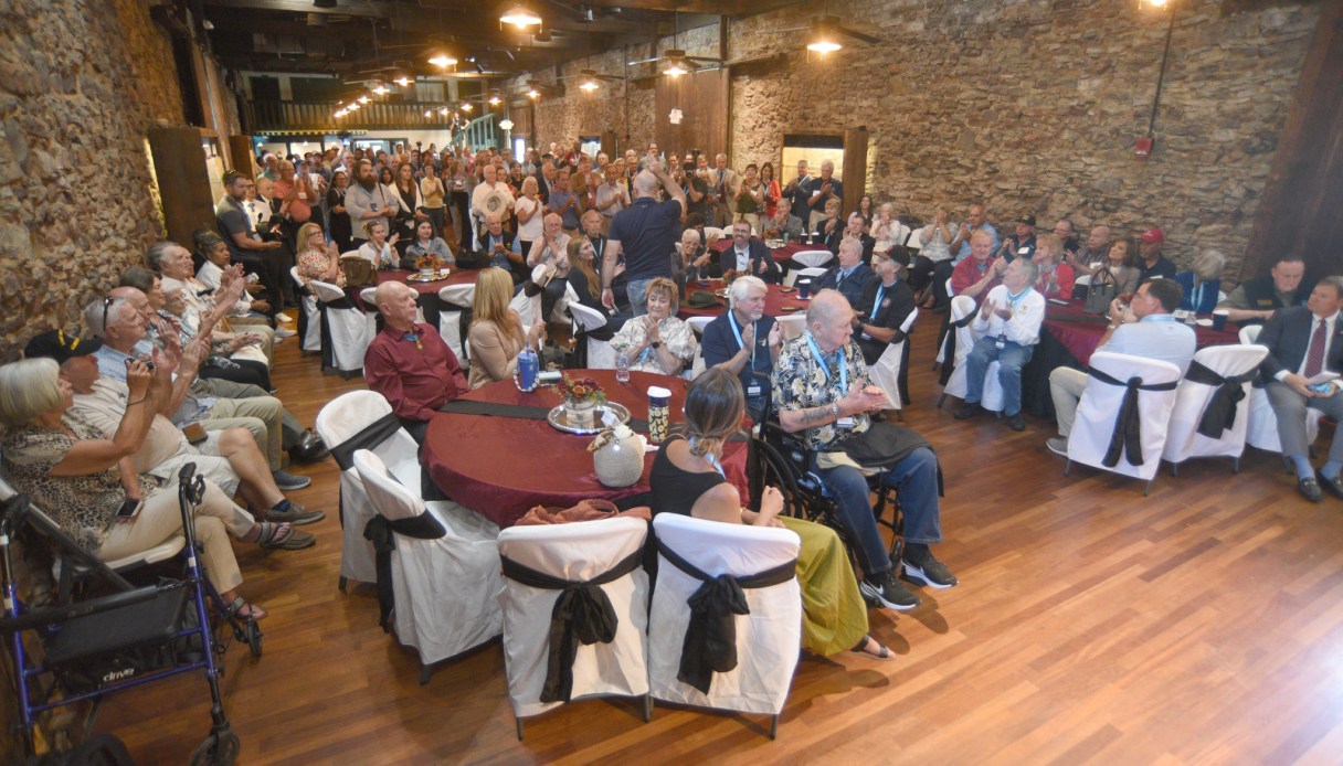 Staff photo by Matt Hamilton/ Visitors applaud as the thirteen Medal of Honor recipients in attendance are recognized at the Ringgold Depot on Tuesday, September 30, 2025.