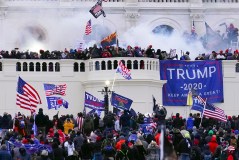 AP Photo by John Minchillo, File / Rioters storm the West Front of the U.S. Capitol Jan. 6, 2021, in Washington.