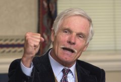 Ted Turner raises his fist as makes a point during a seminar with students in Chattanooga, Tenn. in this 2001 file photo. (AP Photo/Chattanooga Times and FreePress, Alex McMahan)