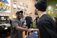 Staff file Photo by Seth Carpenter / Chattanooga-born rapper Isaiah Rashad shakes hands with a fan during a signing of his new album ‘It's Been Awful' at Dallos Vinyl Love on Saturday, June 20, 2026.