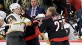 FILE - Vegas Golden Knights center Brett Howden (21) mixes it up with Carolina Hurricanes left wing Nikolaj Ehlers (27) during the third period of an NHL hockey game Oct. 28, 2025, in Raleigh, N.C. (AP Photo/Chris Seward, File)