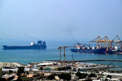 AFP/Getty Images/TNS / Ships are docked along a pier at the Khor Fakkan Container Terminal, the only natural deep-sea port in the region and one of the major container ports in Sharjah Emirate, along the Gulf of Oman on July 14, 2026. Tehran announced it was closing the Strait of Hormuz on July 12 and launched missiles and drones at its Gulf neighbors, in retaliation for new US strikes following an attack by Iranian forces on a merchant vessel that was abandoned in flames by its crew.
