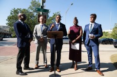 Staff Photo by Seth Carpenter / Hamilton County Commissioner Montrell Besley, center, speaks Sept. 1, 2026, beside fellow commissioners, from left, Warren Mackey, David Sharpe, Katherlyn Geter and Joshua Wichman, during a press conference about the Hamilton County school board District 11 vacancy. The five Democrats spoke at the corner of Carter and West 12th streets.