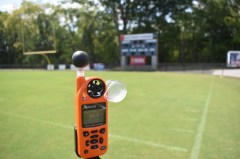Staff Photo by Patrick MacCoon / The wet-bulb globe temperature monitor at East Ridge High School reads 94.9 degrees Fahrenheit on Tuesday afternoon. Per TSSAA rules, outdoor practices are not allowed when the device shows a temperature above 92 degrees or if the heat index is above 104.