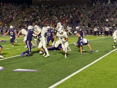 Staff Photo by Stephen Hargis / Marion County's T.J. Starkey looks for running room against the Sequatchie County defense during his team's 23-15 road win Friday night.
