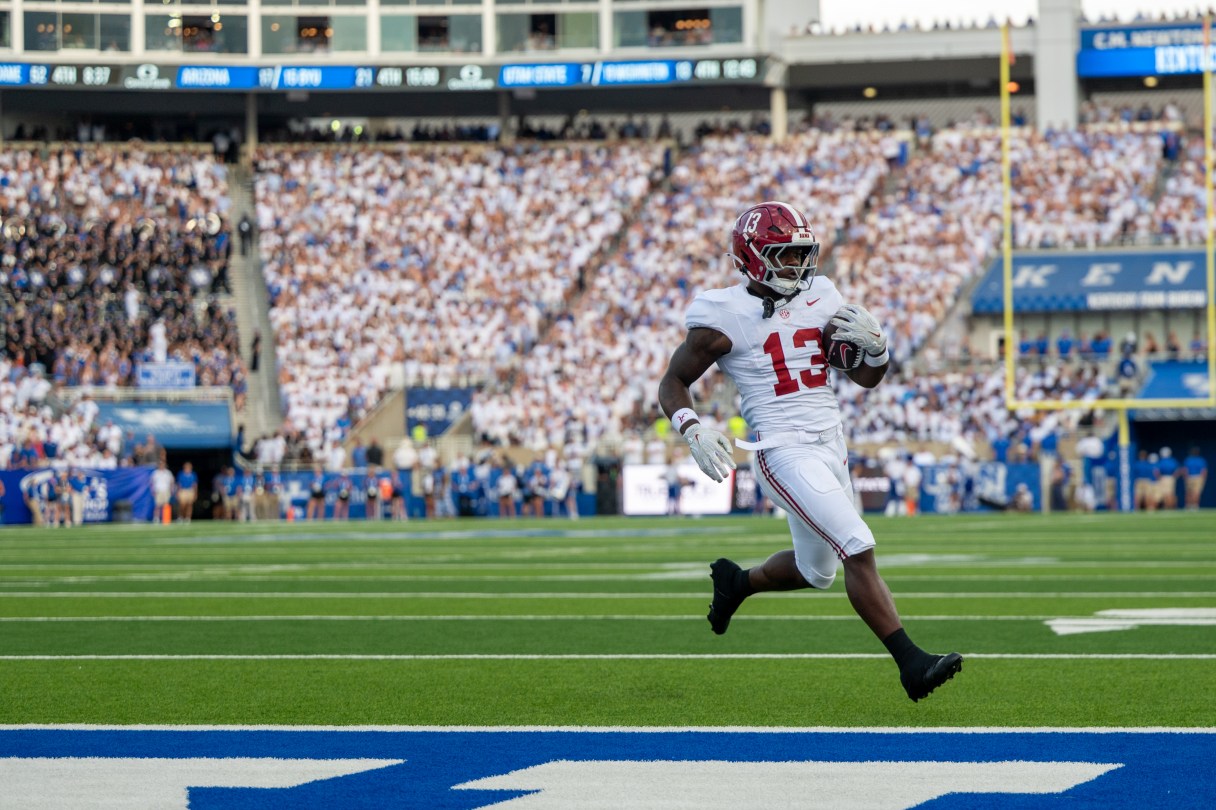 Alabama running back EJ Crowell scores a touchdown during the second half of the Crimson Tide's win against Kentucky in the the SEC opener for both teams Saturday at Lexington's Kroger Field. (AP Photo/Tony Wagner)