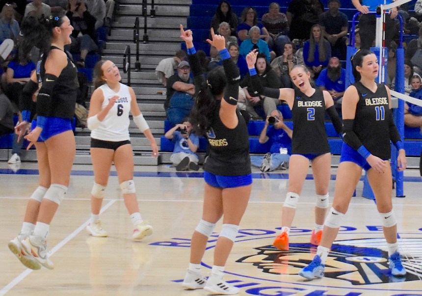 Staff photo by Patrick MacCoon / Bledsoe County celebrates after a kill by sophomore Carson Sells (11) in Monday's home victory over Sequatchie County. The 25-win Lady Warriors are ranked fifth in the state in Class 1A by MaxPreps as the postseason begins next week.