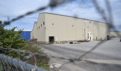 Staff file photo by Matt Hamilton / The former Aerisyn plant at 959 Windtower Drive is pictured April 3, 2026. The owners of the plant want their property exempt from development rules at The Bend.
