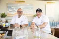 Staff Photo by Seth Carpenter/ Bill Heckler, SquareOne Holding Company managing director of culinary, left, and Scott Eiselstein, SOHC corporate research & development chef, sit down together at the Olos rooftop restaurant on Wednesday, Oct. 7, 2026.