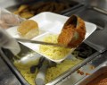 AP File Photo/Susan Walsh / Spaghetti is dished out during lunch service at the Patrick Henry Elementary School in Alexandria, Va., on April 29, 2014.