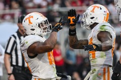 Tennessee running back DeSean Bishop, left, celebrates with receiver Braylon Staley, right, after running for a touchdown during Saturday's game against Arkansas at Reynolds Razorback Stadium in Fayetteville. (AP Photo/Michael Woods)