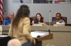 Staff File Photo By Matt Hamilton / School board members look on as Anne Lowery, executive director of Tennessee Stands, speaks in support of the Ten Commandments in public schools during a Hamilton County School Board meeting in October 2026.