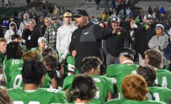 Staff photo by Patrick MacCoon / Rhea County football coach Taylor Harvey speaks to his team after Friday night's 50-3 home win over Loudon.