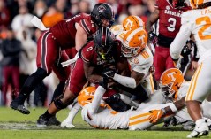 Tennessee Athletics photo / Tennessee linebacker Juwan Mitchell brings down South Carolina tight end Jaheim Bell during the 63-38 rout by the Gamecocks over the Volunteers in 2022.