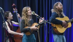 Staff photo by Matt Hamilton / Canadian band Under the Rocks performs during the IBMA World of Bluegrass at the Chattanooga Convention Center on Oct. 20, 2026. From left are, Jillian McKenna, Chloe Davidson and Jordan Klassen.