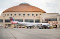 Staff Photo by Seth Carpenter / A refueling truck pulls up beside an American Eagle airplane at the Chattanooga Airport on Oct. 2, 2026. A state aviation study shows the airport and 17 other airports in the region had a $5.2 billion economic impact in 2025, with the Chattanooga facility drawing almost 245,000 visitors, producing a $1.66 billion economic impact.