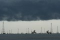 FILE - Clouds form over pumpjacks and power transmission towers on Lake Maracaibo in Cabimas, Venezuela, Sept. 1, 2026. (AP Photo/Ariana Cubillos, File)