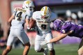UTC photo by Willis Glassgow / UTC running back Kevin Lalin (9) fights for some of his 141 rushing yards in the Mocs' 41-18 win at Western Carolina on Saturday in Cullowhee, N.C.