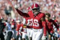 Alabama defensive back Chuck McDonald III (19) celebrates after his interception during the first half of Saturday's SEC matchup with visiting Texas A&M at Bryant-Denny Stadium in Tuscaloosa. (AP Photo/Vasha Hunt)