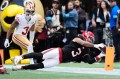 Atlanta Falcons safety Jessie Bates III (3) intercepts a pass by San Francisco 49ers quarterback Brock Purdy, not pictured, during the second half of Sunday's game at Mercedes-Benz Stadium. (AP Photo/Mike Stewart)